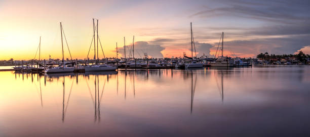 istock Sunrise over a quiet harbor in old Naples, 1045116728