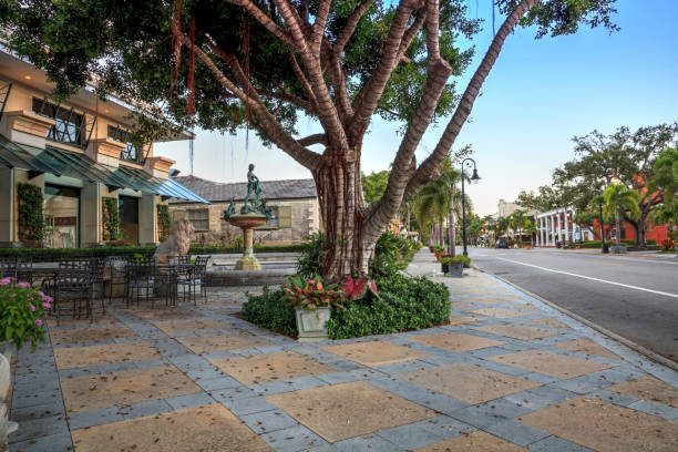 Naples, Florida, USA - September 22, 2018: Sunrise over the Third Street shopping district in Old Naples, Florida.