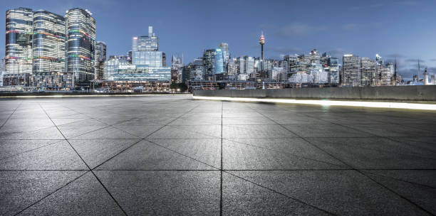 istock empty pavement front of sydney cityscape 1045130204