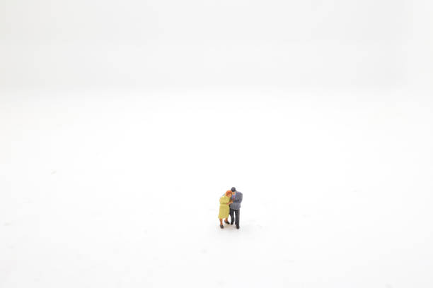 istock a mini of figure couple standing board 1045133330