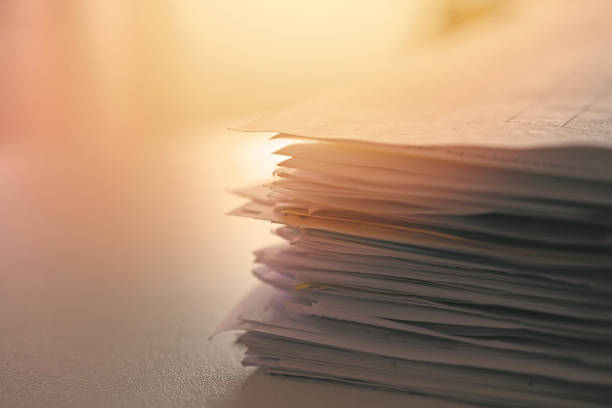 istock Stack of paper files on work desk in office 1045140988