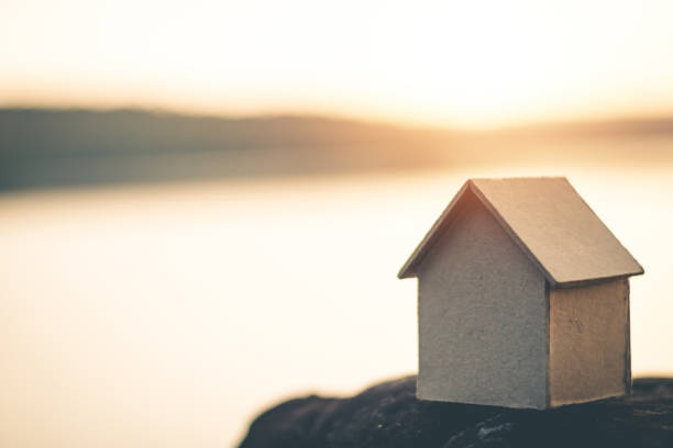 istock Saving money for future use in the small house, sustainability concept. 1045161960