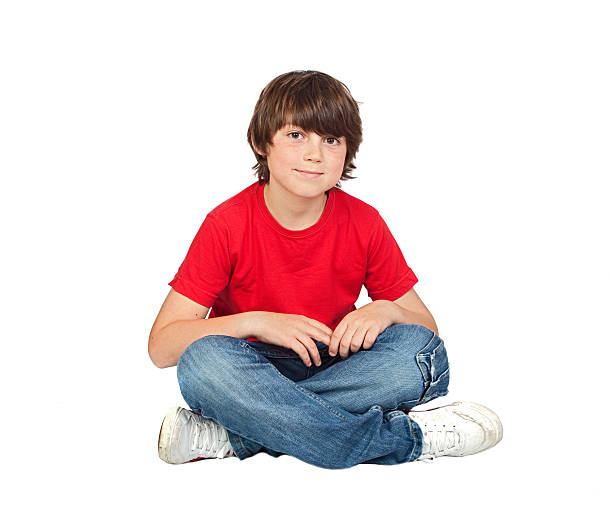 istock Funny freckled boy sitting on the floor 104516672