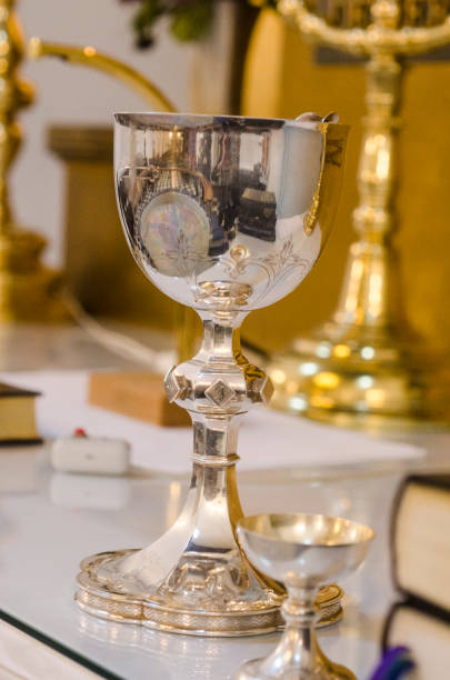 istock Mug in silver for supper in the church 1045172510