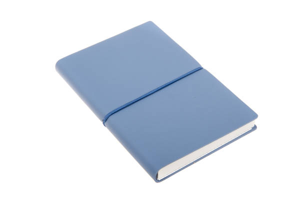 istock Blue color cover note book isolated. Sketch book. Diary notebook in blue leather cover 1045183014