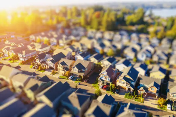 Aerial photo of an American suburban neighborhood with a tilt-shift effect at sunset