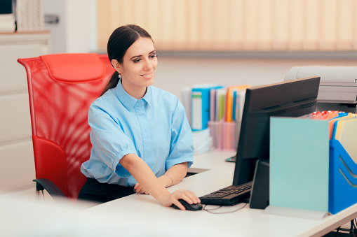 Busy woman having a desk job in corporate building