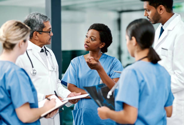 238,900+ Healthcare Team Stock Photos, Pictures & Royalty-Free Images - iStock | Health care team with patient, Healthcare team work, Healthcare professionals