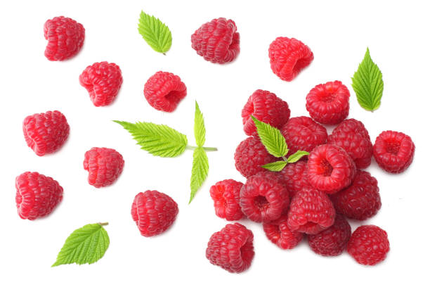 istock ripe raspberries with green leaf isolated on white background. top view 1045203726