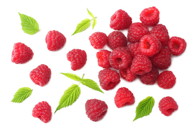 istock ripe raspberries with green leaf isolated on white background. top view 1045203728