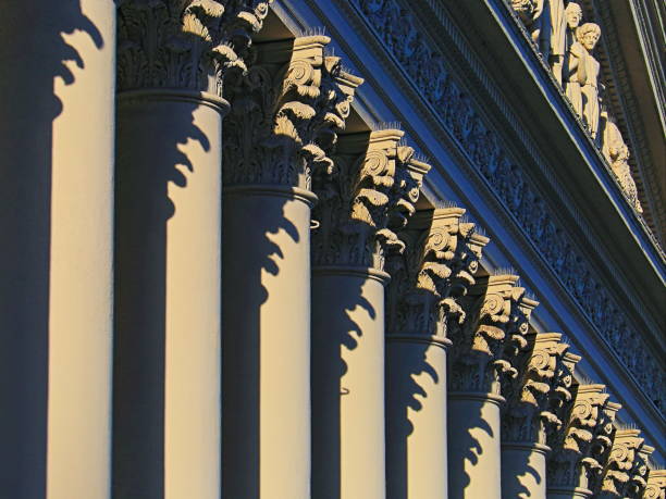 istock Corinthian greek architectural columns pattern – classical architecture, building detail 1045210060