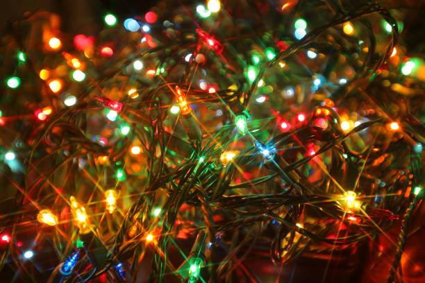noel ışıkları kapatmak - christmas lights stok fotoğraflar ve resimler