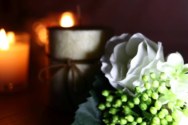 istock White flowers and candles 1045213354