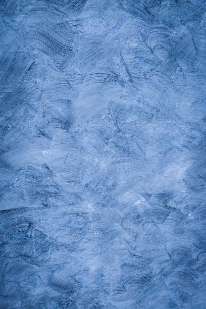 istock Blue and Gray Brushed white concrete wall texture 1045217624