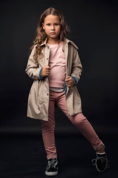 istock girls posing in autumn clothes in the Studio 1045218124