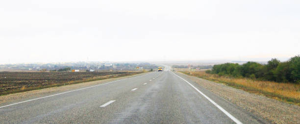 istock Highway landscape with moving cars at daytime 1045220676
