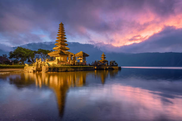 istock Ancient Pura Ulun Danu Bratan temple reflection with colorful sky at sunrise 1045220918