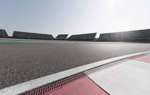 Empty Racing Track With Sunlight
