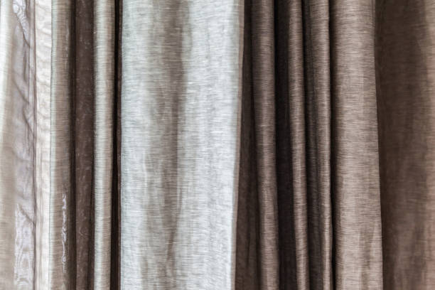 istock gray curtains at the windows 1045228340