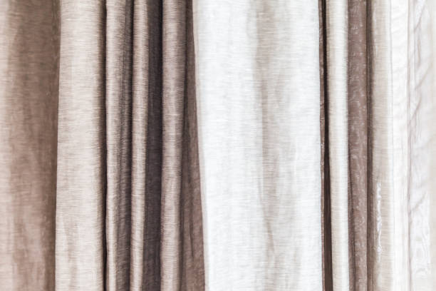 istock gray curtains at the windows 1045228386