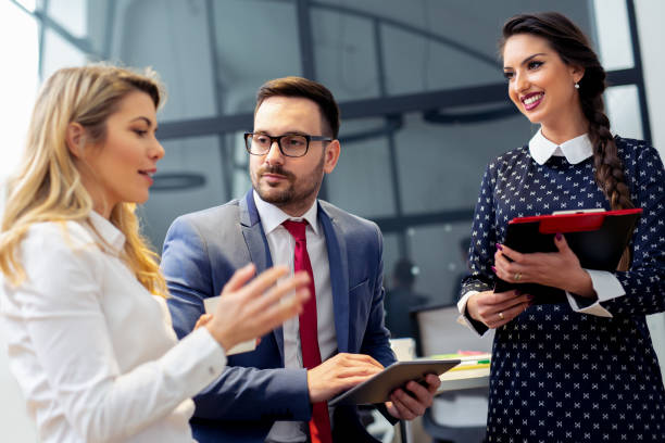 istock Group of business persons in discussion 1045238750