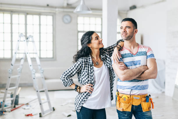 istock Home owners in their new apartment 1045254426