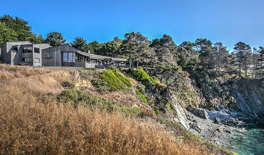 house by pacific ocean in Sonoma Mendocino California on sunny day by ocean