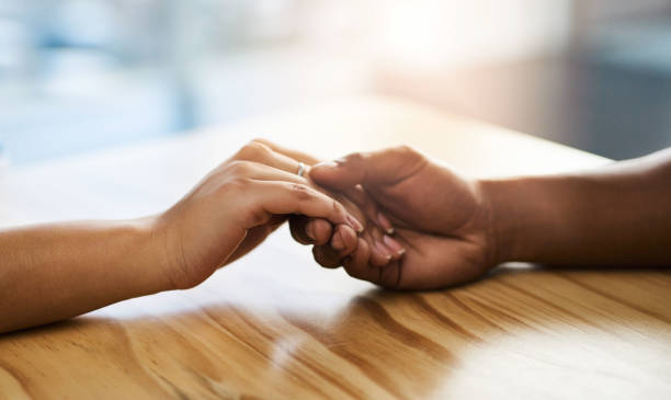 istock Sometimes all we need is a hand to hold 1045269574