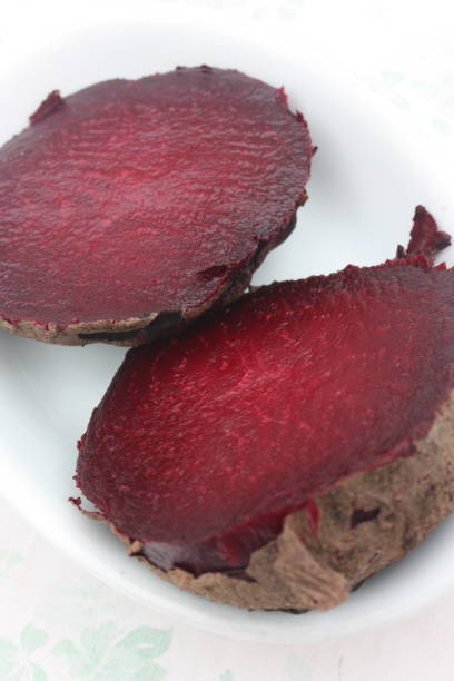 istock Red beet cooked in water cut in half 1045273358