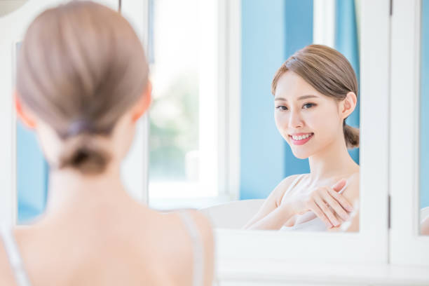 istock woman apply cream with arm 1045278820