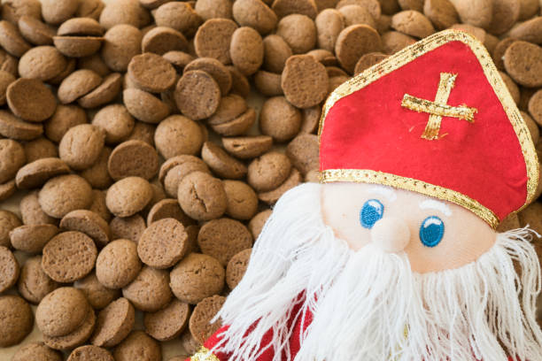 istock traditional cookie called kruidnoten, with doll, for Dutch event Sinterklaas 1045282428