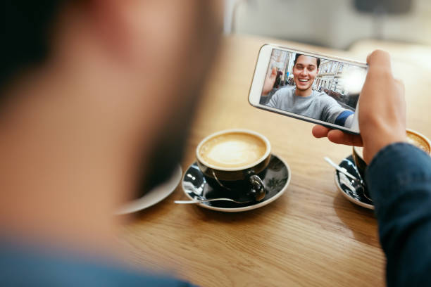 istock Online Video Call. Close Up Man Calling Using Phone 1045283548