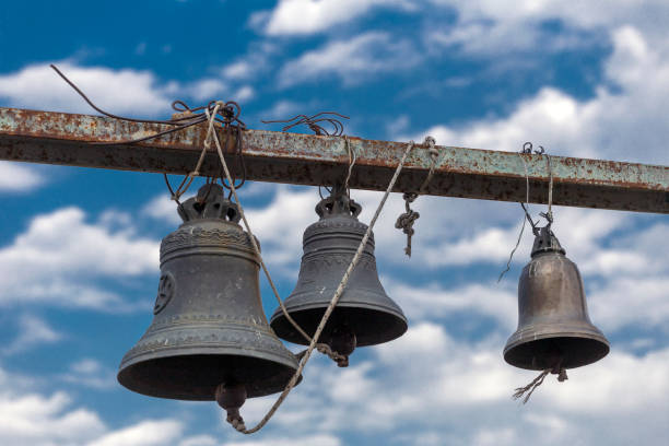 istock Church bells against the blue sky with clouds 1045283762