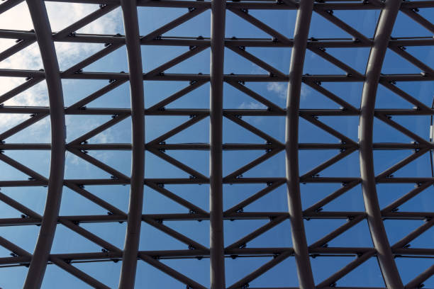 istock Pattern of pipes on sky background architectural design 1045283812