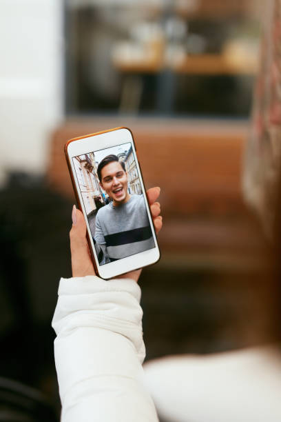 istock Video Call On Phone. Close Up Hand With Phone And Face On Screen 1045286106