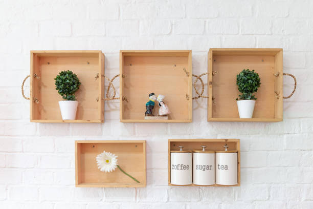 interior decoration placed on wooden shelf with white brick wall.