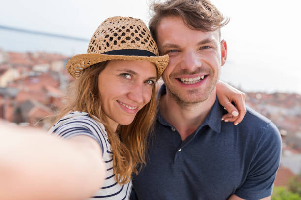 istock Men and women taking selfie 1045297668