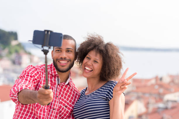 istock Men and women taking selfie 1045297688