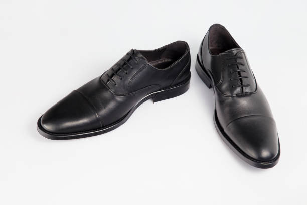 istock Male black leather elegant shoe on white background, isolated product. 1045306562