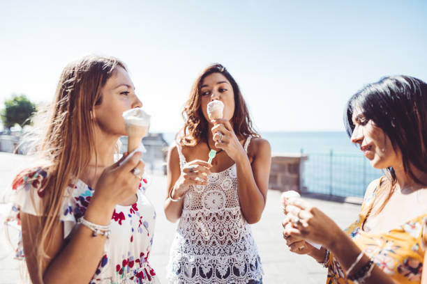 istock friends eating an icecream at summer 1045306726