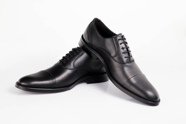 istock Male black leather elegant shoe on white background, isolated product. 1045306744