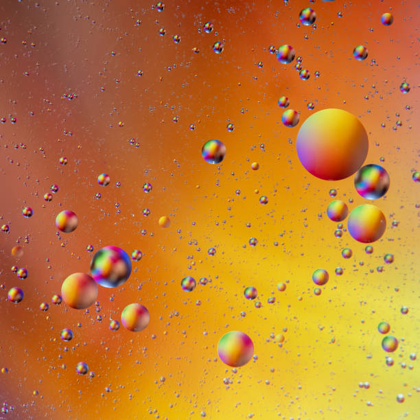 istock Bright rainbow bubbles abstract background. Oil and water abstract pattern. 1045317044