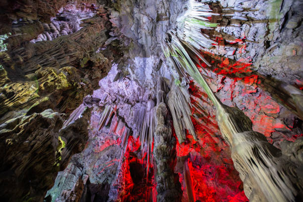 Stalactites inside of the St. Michaels cave in Gibraltar. St. Michael's Cave is a network of limestone caves located in Gibraltar.