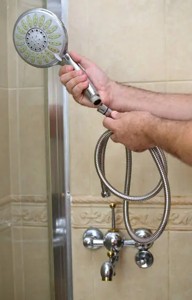 Installing a new shower hose on an used showerhead