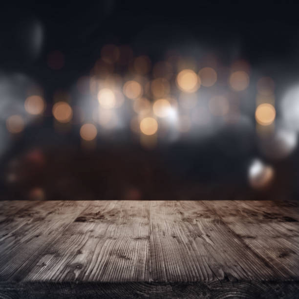 istock Christmas background with wooden table 1045335076