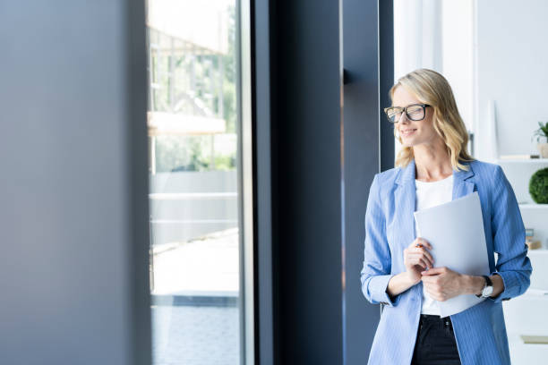 istock Modern business woman in the office with copy space. 1045336042