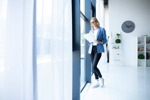 istock Modern business woman in the office with copy space. 1045336054