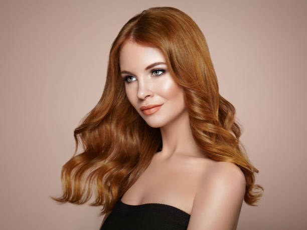 istock Redhead woman with curly hair 1045338694
