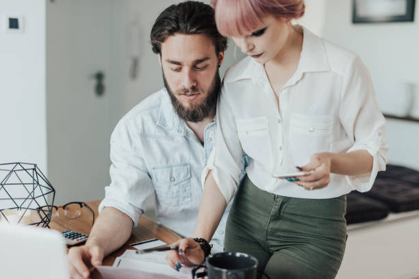 istock Couple discussing home economics 1045347766