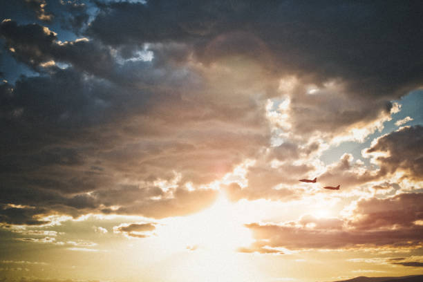Travel, airplanes in sunset sky